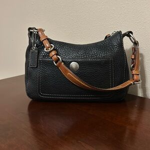 Coach leather black purse with brown leather strap